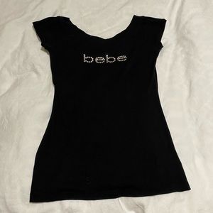 Off the shoulder black Bebe shirt with rhinestone logo